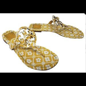 Fun Tory Burch yellow flip flops.